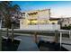 Luxurious waterfront home with two balconies and a private dock, perfect for enjoying sunsets at 3550 Flamingo Ave, Sarasota, FL 34242