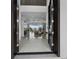 Grand foyer featuring open double doors leading into a luxurious living space at 3550 Flamingo Ave, Sarasota, FL 34242