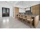 Modern kitchen featuring a large island, breakfast bar and stainless steel appliances at 3550 Flamingo Ave, Sarasota, FL 34242