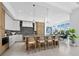Well-appointed kitchen island with seating, stainless appliances, and an open-concept design at 3550 Flamingo Ave, Sarasota, FL 34242