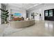 Elegant living room featuring tile floors, plush seating, and a flat-screen TV at 3550 Flamingo Ave, Sarasota, FL 34242