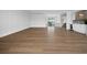 Spacious living room with hardwood flooring, a wet bar, and lots of natural light at 3550 Flamingo Ave, Sarasota, FL 34242