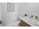 Stylish powder room features modern fixtures, sleek vanity, and elegant decor, creating a sophisticated and functional space at 3550 Flamingo Ave, Sarasota, FL 34242
