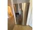 Stainless steel refrigerator with water dispenser provides convenience and style at 14812 Skip Jack Loop, Lakewood Ranch, FL 34202