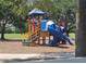 Colorful playground with slides and climbing structures at 14812 Skip Jack Loop, Lakewood Ranch, FL 34202