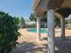 Community pool with covered seating and surrounding landscaping at 14812 Skip Jack Loop, Lakewood Ranch, FL 34202