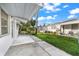Nice patio area with awning and access to the backyard at 6038 Lilli Way # 6038, Bradenton, FL 34207