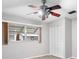 Bedroom with ceiling fan, window, and closet at 6038 Lilli Way # 6038, Bradenton, FL 34207