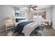 Spacious bedroom with a comfortable bed and ample natural light at 6038 Lilli Way # 6038, Bradenton, FL 34207