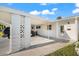 Covered carport and walkway to condo entrance at 6038 Lilli Way # 6038, Bradenton, FL 34207