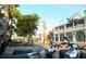 Scenic street view featuring shops and palm trees in Anna Maria Island at 6038 Lilli Way # 6038, Bradenton, FL 34207
