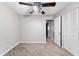 Spacious bedroom with ceiling fan and wood-look floors at 6038 Lilli Way # 6038, Bradenton, FL 34207