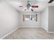 Bedroom with ceiling fan, window, and closet at 6038 Lilli Way # 6038, Bradenton, FL 34207