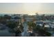 Aerial view of a coastal town at sunset, beach and ocean visible at 6038 Lilli Way # 6038, Bradenton, FL 34207