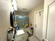 Clean bathroom with shower/tub combo and updated vanity at 2760 Chipley Ave, North Port, FL 34286