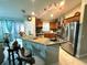 Modern kitchen with stainless steel appliances and granite countertops at 2760 Chipley Ave, North Port, FL 34286