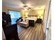 Bright and airy bedroom with a king-size bed and ample closet space at 2760 Chipley Ave, North Port, FL 34286