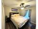 Spacious Primary bedroom with king-size bed and plenty of natural light at 2760 Chipley Ave, North Port, FL 34286