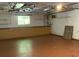 Unfinished basement with a built-in workbench and plenty of room for storage and customization at 360 Gulf Of Mexico Dr # 322, Longboat Key, FL 34228