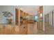 Spacious kitchen with granite counters, custom cabinets, stainless steel appliances and tile flooring at 360 Gulf Of Mexico Dr # 322, Longboat Key, FL 34228