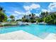 Stunning community pool with clear blue water and luxurious poolside amenities for residents at 360 Gulf Of Mexico Dr # 322, Longboat Key, FL 34228