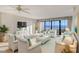 Bright living room with ocean views and comfy seating at 5300 Ocean Blvd # 803, Sarasota, FL 34242