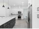 Modern kitchen with stainless steel appliances and white shaker cabinets at 4549 Targee Ave, North Port, FL 34287