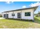 Modern house exterior with a two car garage at 4549 Targee Ave, North Port, FL 34287