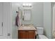 Bathroom featuring a vanity with sink and toilet and a shower at 6309 75Th E Ave, Palmetto, FL 34221