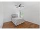 Relaxing bedroom featuring wood floors, and a plush bed, illuminated by natural light at 6309 75Th E Ave, Palmetto, FL 34221