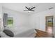 A serene bedroom with wood floors and abundant natural light at 6309 75Th E Ave, Palmetto, FL 34221