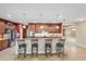 Gourmet kitchen with granite countertops, stainless steel appliances, and a breakfast bar with seating at 6309 75Th E Ave, Palmetto, FL 34221