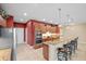 Modern kitchen features granite counters, stainless appliances, and a breakfast bar for entertaining at 6309 75Th E Ave, Palmetto, FL 34221