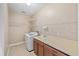 Functional laundry room with ample counter space, cabinetry, and convenient shelving at 6309 75Th E Ave, Palmetto, FL 34221