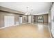 Spacious living room featuring neutral paint, beautiful tile floors, and lots of natural light at 6309 75Th E Ave, Palmetto, FL 34221