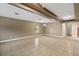 Spacious living room featuring neutral paint, beautiful tile floors, and natural light at 6309 75Th E Ave, Palmetto, FL 34221