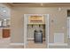 Convenient wine storage area features shelving and a wine cooler, perfect for enthusiasts at 6309 75Th E Ave, Palmetto, FL 34221