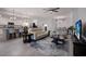 Open concept living area with modern furniture and stylish decor at 6056 Worsham Ln # 104, Lakewood Ranch, FL 34211