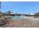 Relaxing resort-style pool with lounge chairs and umbrellas at 6056 Worsham Ln # 104, Lakewood Ranch, FL 34211
