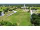 Aerial view of large grassy soccer field with surrounding trees at 6309 75Th E Ave, Palmetto, FL 34221