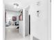 Clean hallway leading to living room and other rooms at 4660 Ocean Blvd # Q2, Sarasota, FL 34242