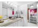 Clean bathroom with white cabinets and a shower/tub combo at 4660 Ocean Blvd # Q2, Sarasota, FL 34242