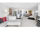 Open living and dining area with white furniture at 4660 Ocean Blvd # Q2, Sarasota, FL 34242