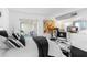 Bright bedroom with a comfortable bed and access to a balcony at 4660 Ocean Blvd # Q2, Sarasota, FL 34242