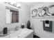 Stylish bathroom with gray hexagon tile and modern vanity at 4660 Ocean Blvd # Q2, Sarasota, FL 34242