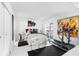 Modern bedroom with large art and a treadmill at 4660 Ocean Blvd # Q2, Sarasota, FL 34242
