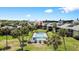 Aerial view of condo community with pool and lush landscaping at 4660 Ocean Blvd # Q2, Sarasota, FL 34242