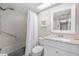 Clean bathroom featuring a shower/tub combo, vanity with granite countertop at 1623 Pelican Cove Rd # 226, Sarasota, FL 34231