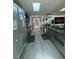 Updated kitchen featuring stainless steel appliances, skylights, and views of the backyard at 5023 Inverness Dr, Sarasota, FL 34243