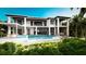 Inviting pool area with expansive patio, ideal for relaxation and entertaining at 4544 Woodside Rd, Sarasota, FL 34242